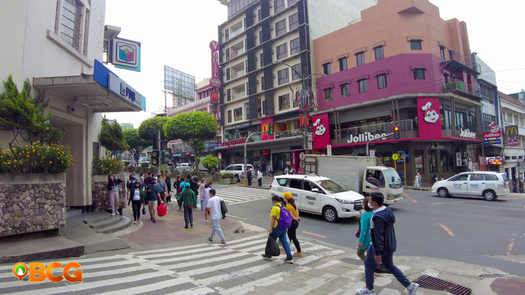 Redeveloped Session Road featuring improved pathways and greenery in Baguio City.